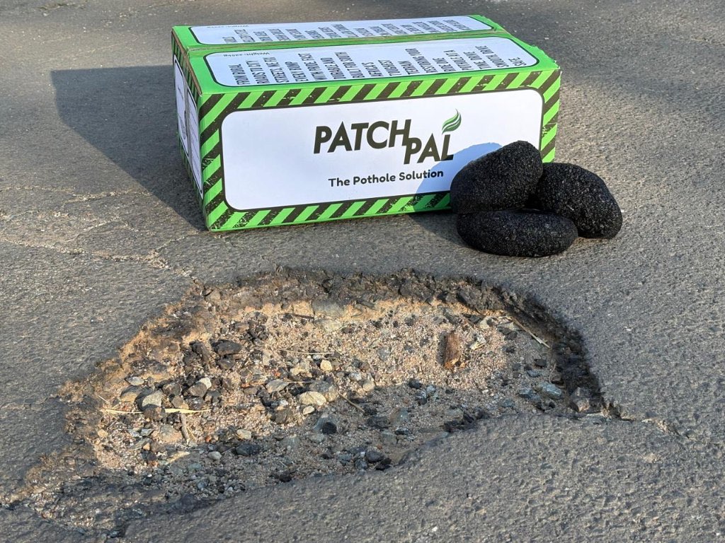PatchPlus crew installing a municipal pothole repair